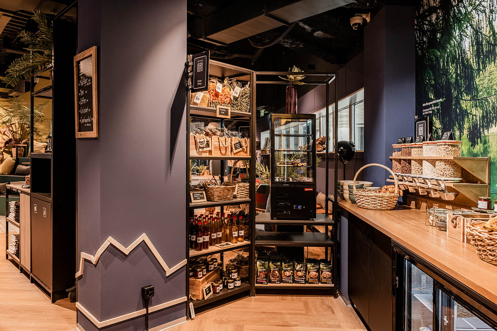 Boutique grocery shop with snacks and drinks at Capsule Hotel Alpine Garden Zurich Airport.