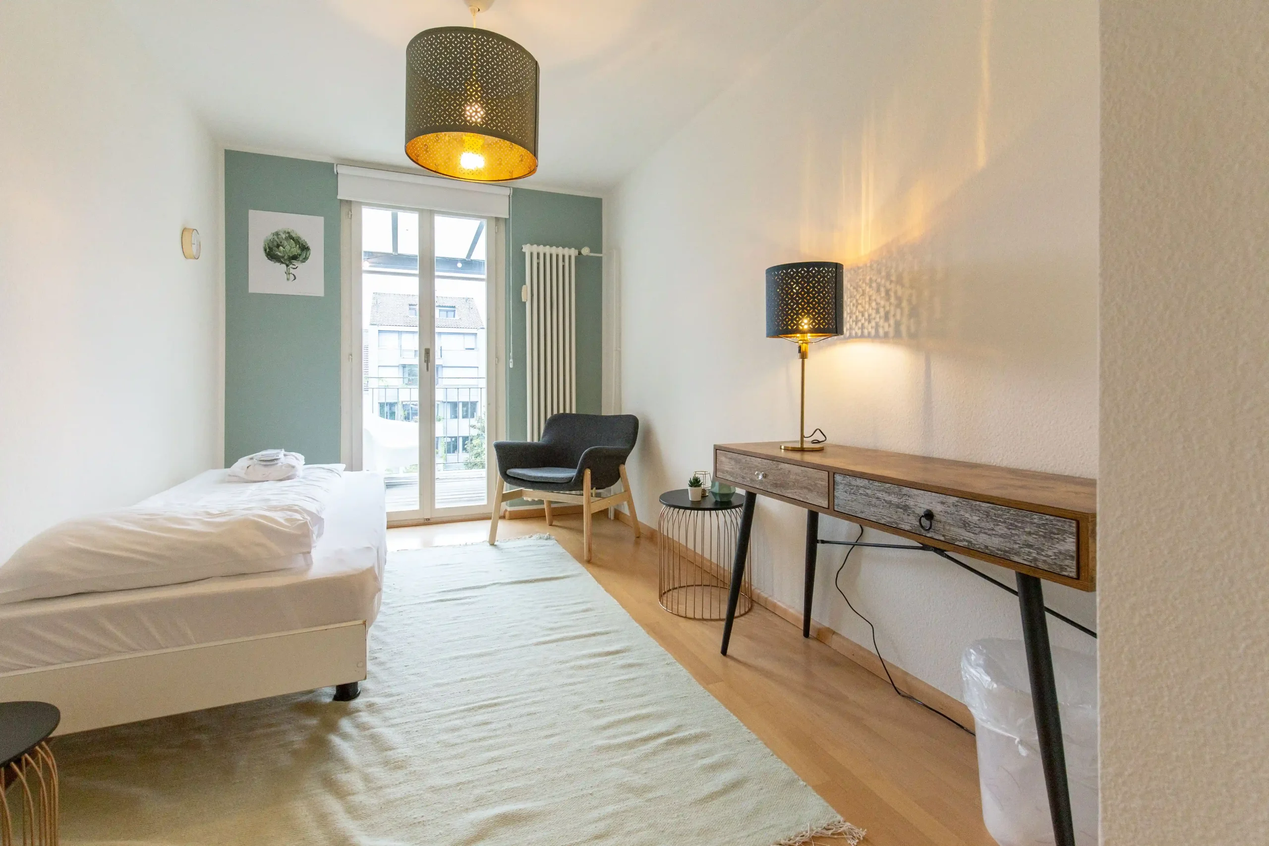 Modern minimalist Capsule Hotel room with single bed, desk, chair, and soft lighting.